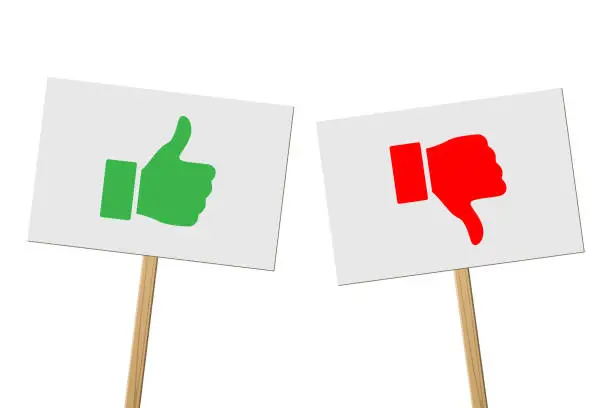 Vector illustration of Green Thumbs Up and red Thumbs Down signs on banners on wood sticks. Vector protest signs with Thumb Up and red Thumb Down symbols isolated on white background.