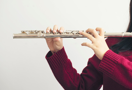 Woman playing flute