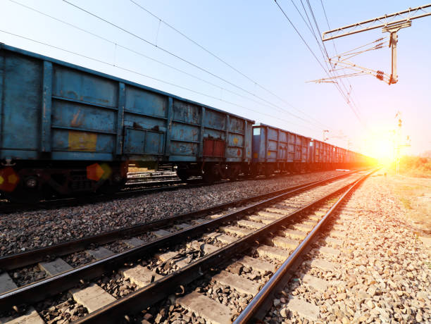 istock Freight train crossing through railroad track 1098186872