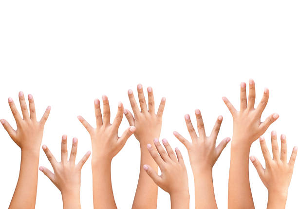 istock children raised up hands on blue sky with clouds 1098186882