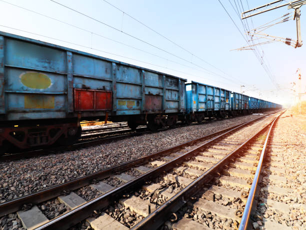 istock Freight train crossing through railroad track 1098186890