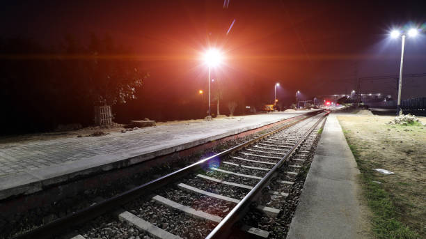 istock Railway track perspective view at night 1098186958