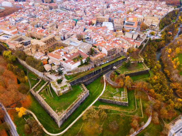 View from drone of medieval town of Pamplona in valley of Arga river, Navarre, Spain