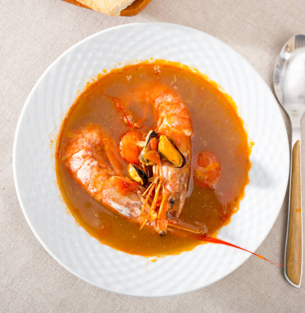 istock Spicy seafood soup with king prawns 1098190748