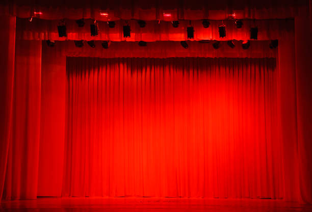 istock background concert scene, in red style, backlight curtains 1098196964