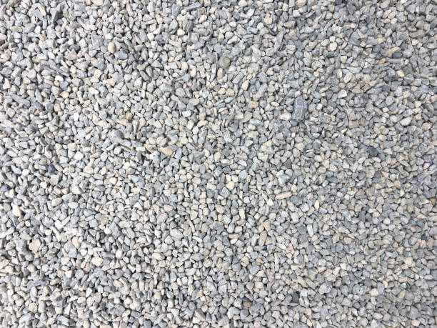 istock Light gray granite gravel floor texture background 1098197308
