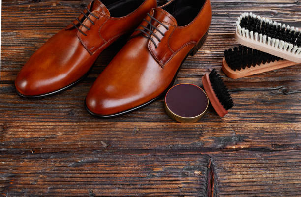 Men shoes and care products stock photo