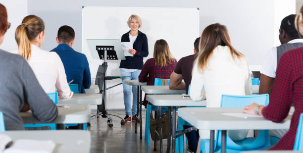 istock Female speaker giving presentation for students 1098197752