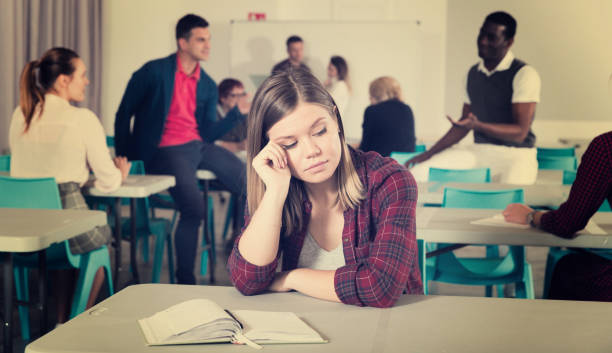 istock Unhappy girl student in class 1098197784