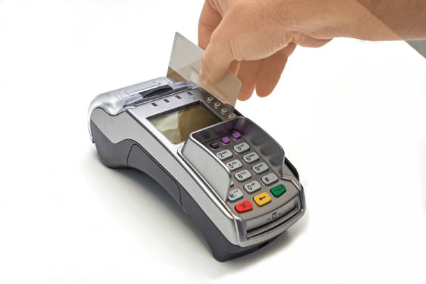 istock Businessman using payment terminal to pay with credit card. 1098208832