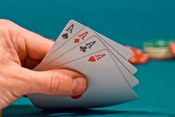 istock playing cards in a people hand 1098210992