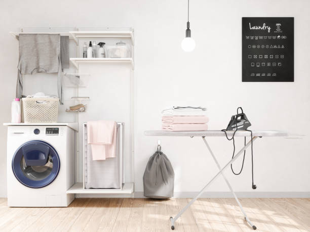 lavanderia con lavatrice, ferro da stiro, tavola di ferro - iron laundry cleaning ironing board foto e immagini stock