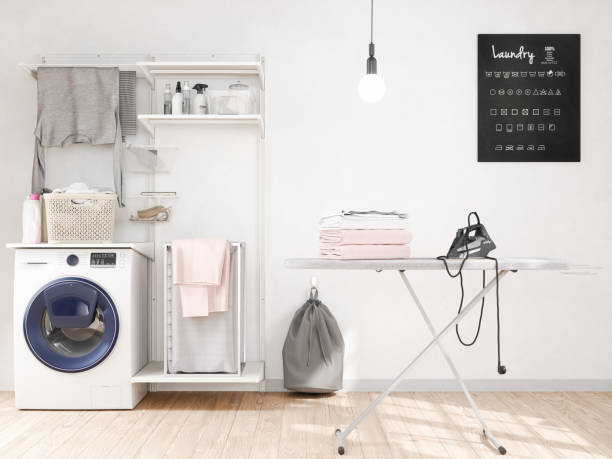 洗濯機、アイロン、アイロン台、洗濯室 - iron laundry cleaning ironing board ストックフォトと画像