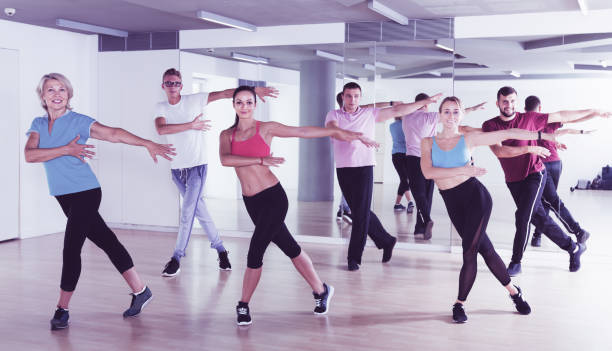 istock Group of happy people of different ages dancing 1098211878