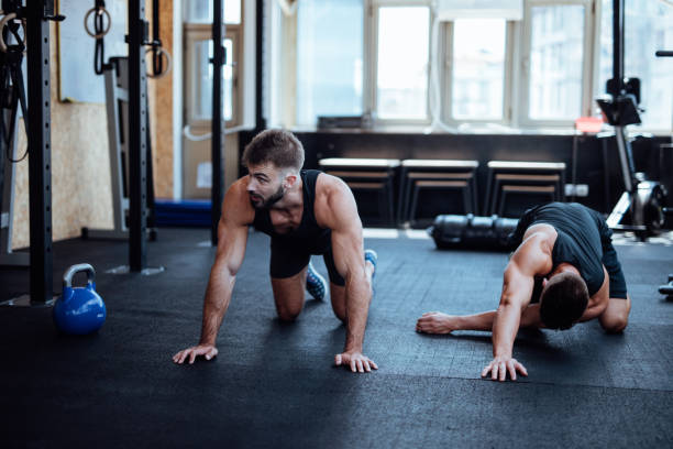 istock Friends working out in a gym 1098212004