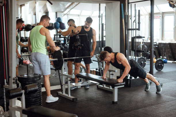 istock Personal trainer filming work out for social media 1098214050