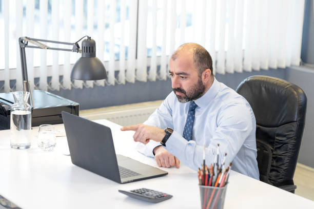 istock A Middle Age Businessman At The Office 1098220616