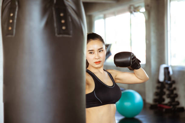 istock gym boxing woman bag strong 1098220828