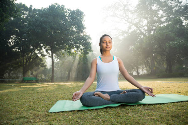 istock Meditation in the park - Stock image 1098223140