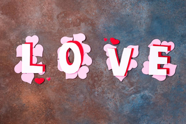 istock Word Love with hearts on a stone background. Valentine's Day 1098223592