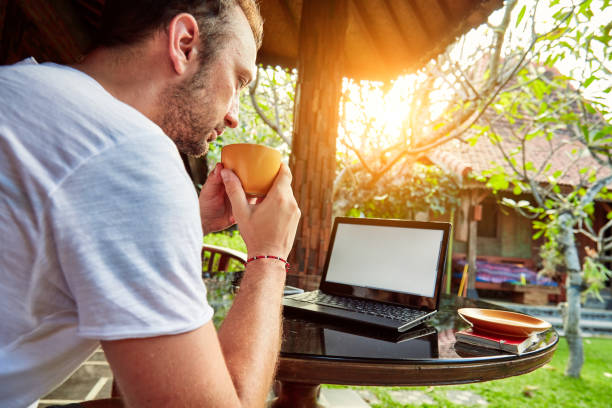 istock Freelancer working on a laptop and vacation. 1098224018
