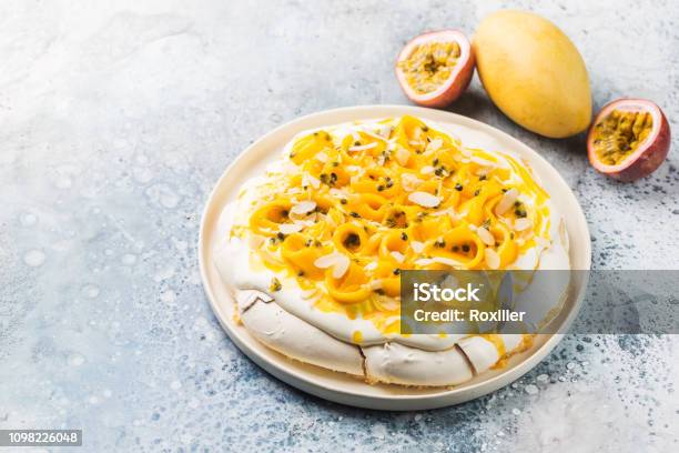 Meringue Cake Pavlova Stock Photo - Download Image Now - Pavlova - Dessert, Mango Fruit, Passion Fruit