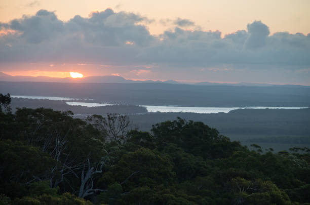 istock Sunsetting over Australian bush and ocean inlet 1098226608
