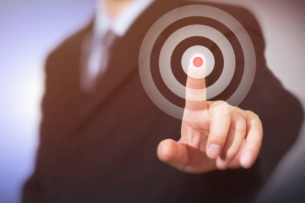 istock Businessman click on target. Business concept. 1098227310