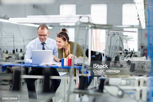 Adult Man And Woman In Factory Stock Photo - Download Image Now - Business, Small Business, Owner
