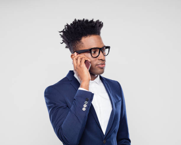 istock Black businessman talking on mobile phone 1098231740
