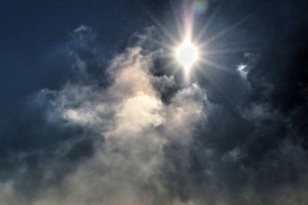 istock Star shape sun in dark blue sky and white vapor clouds going up 1098232802