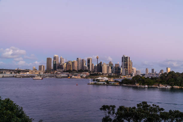 istock generic modern cityscape with water reflection in dawn night 1098233810