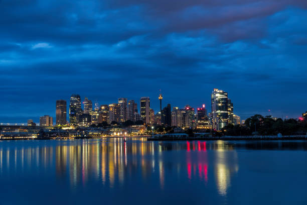 istock generic modern cityscape with water reflection in sunset night 1098233854