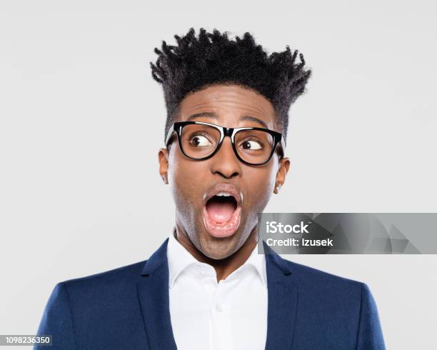 Surprised Afro American Young Businessman Stock Photo - Download Image Now - Eyeglasses, Nerd, Adult