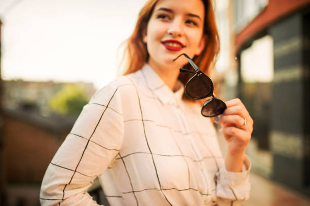 istock Attractive redhaired woman in eyeglasses 1098237820