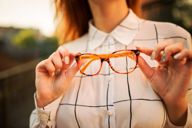istock Attractive redhaired woman in eyeglasses 1098237906