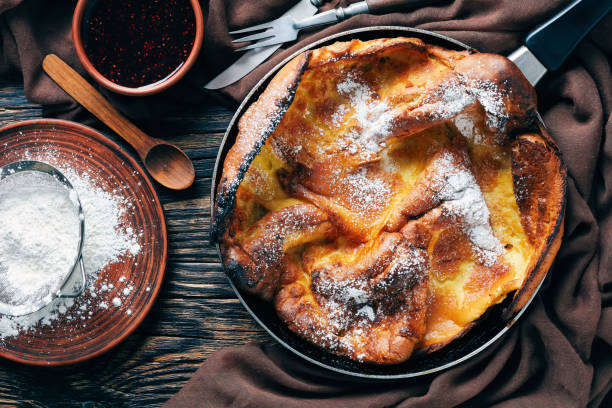 istock dutch baby pancake sprinkled with powdered sugar 1098243138