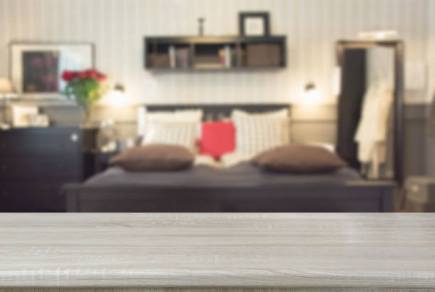 istock Blurred modern bedroom as background with tabletop for display your products. 1098246484