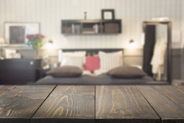 istock Blurred modern bedroom as background with tabletop for display your products. 1098246488