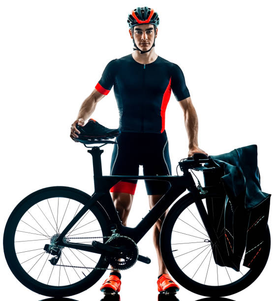 istock triathlete triathlon Cyclist cycling silhouette isolated white b 1098249856