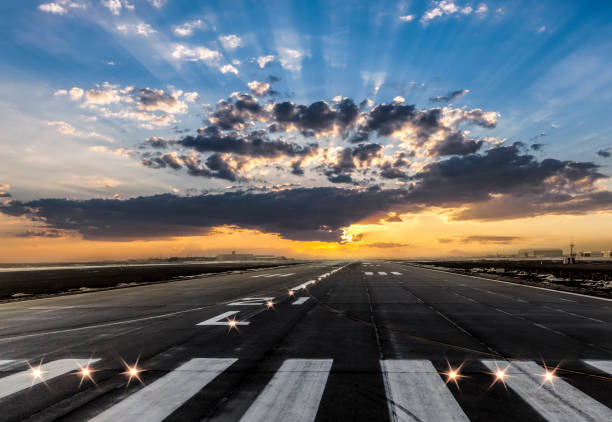 Airport takeoff and landing area at evening Airport takeoff and landing area at evening airfield stock pictures, royalty-free photos & images