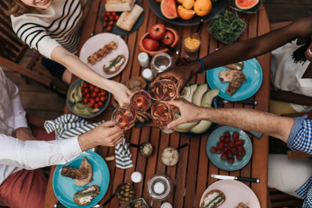 istock Friends toasting with wine 1098251554
