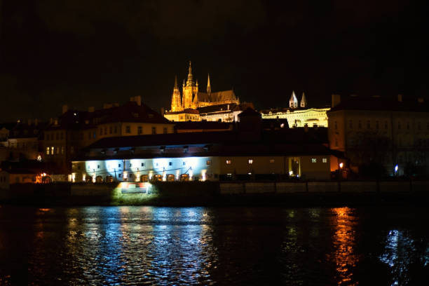istock Prague castle and river at night. 1098253418