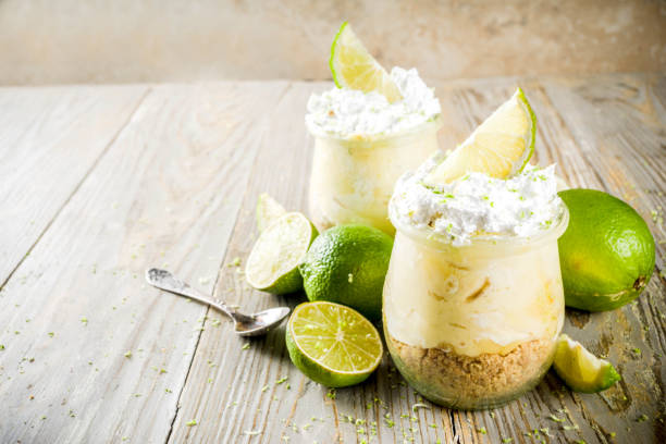 Key lime pie in small jars stock photo