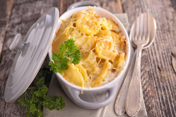 istock baked potato with cream and cheese 1098257112