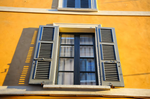 istock Window with blinds an ancient building in Trastevere. Rome, Italy 1098261804