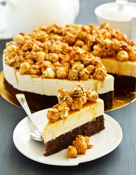 istock Chocolate-caramel cheesecake with popcorn. 1098263372