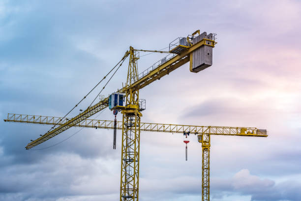 istock Large cranes in a construction of a bridge 1098267634
