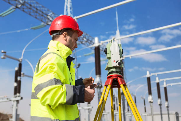 istock Engineer working at electricity station holding digital tablet 1098269580