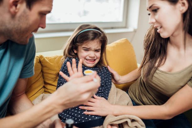 istock Young girl not wanting her medicine 1098270268